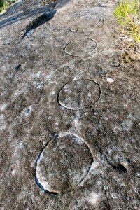 Moon Rock - an engraving of 4 moons and a mundoe